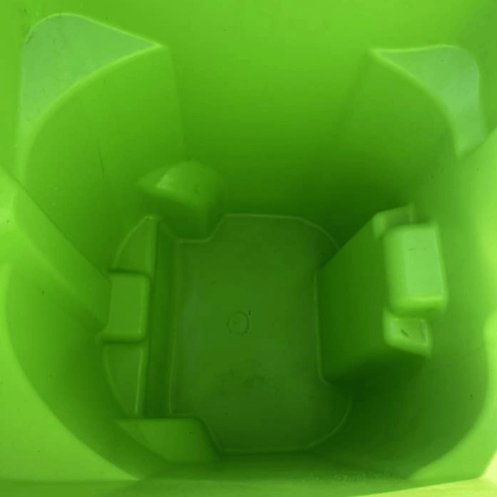 After photo of cleaned green trash bin interior